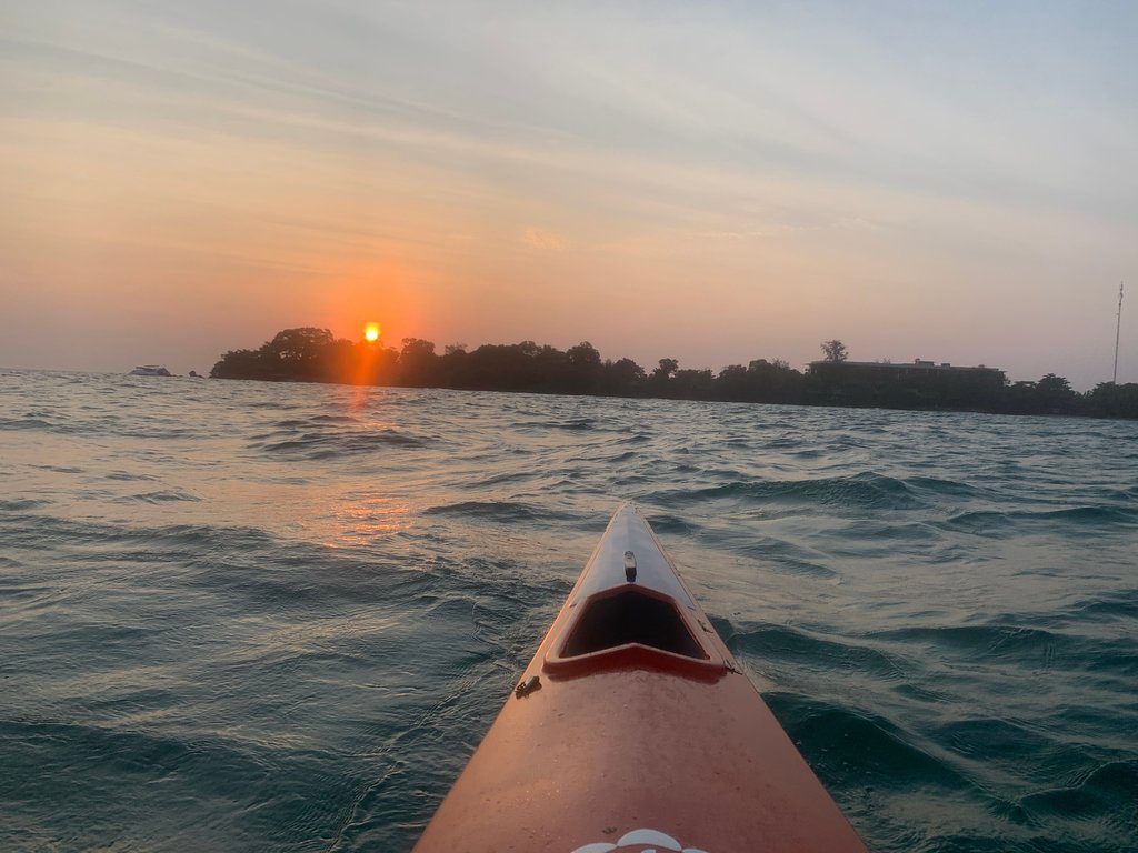 Enjoy Sunset drifting in Halfmoon Bay before our on-beach dinner - Sunset Kayaking Trip