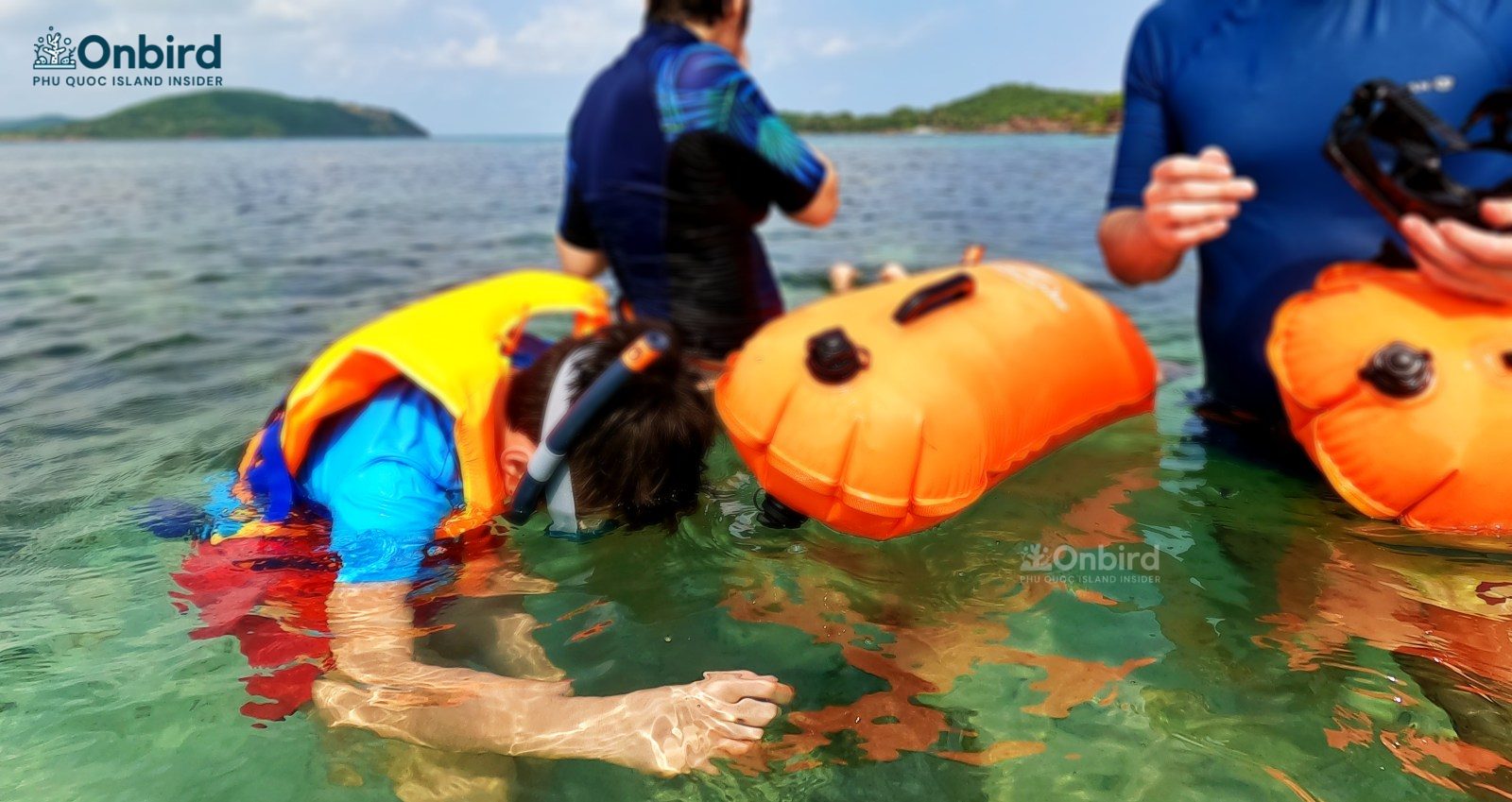 Kids getting acclimated to the water and snorkel gears