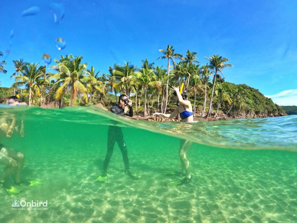 Underwater guide in snorkeling trip in Phu Quoc Island, Vietnam