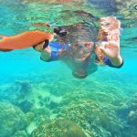 A 6-year-old girl snorkeling at Phu Quoc Coral Mountain, Phu Quoc Island, Vietnam