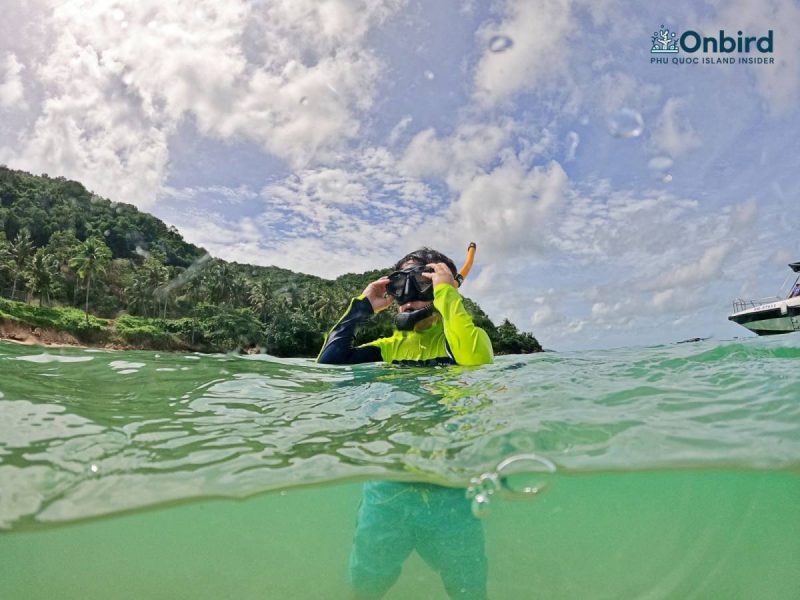 Private family kid snorkeling with OnBird Phu Quoc to explore Phu Quoc coral reefs