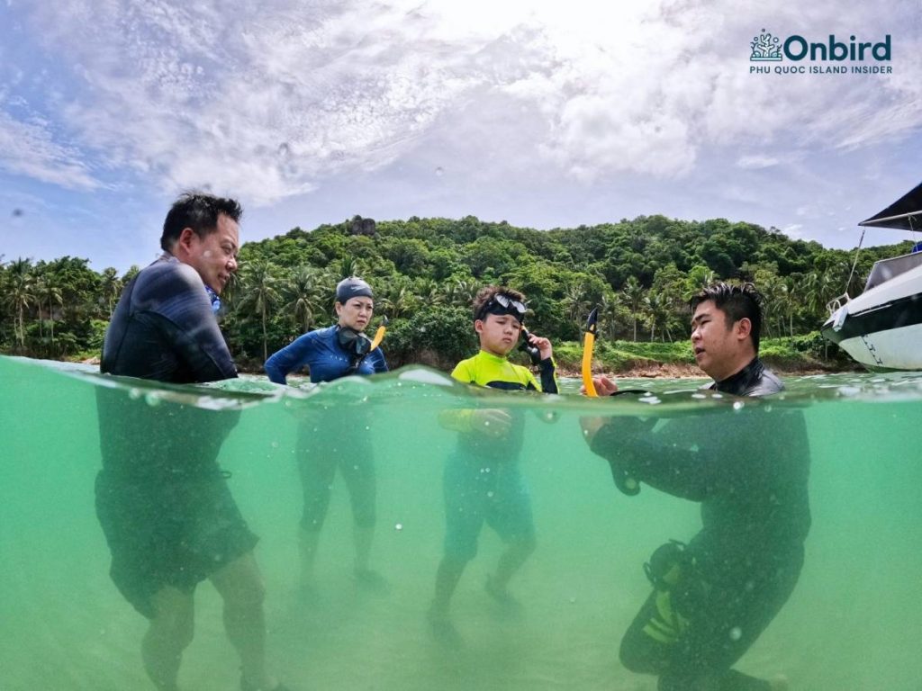 Private family kid snorkeling with OnBird Phu Quoc to explore Phu Quoc coral reefs