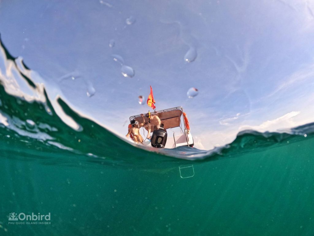Preparing to get into the water to explore the Coral Jungle Reef, Phu Quoc, Vietnam