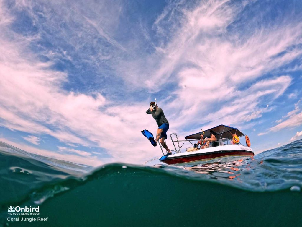 Jump into the water of Coral Jungle Reef, Phu Quoc Island, Vietnam