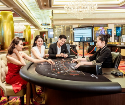 Phu Quoc casino staff working at a roulette table, illustrating job opportunities in the entertainment sector.