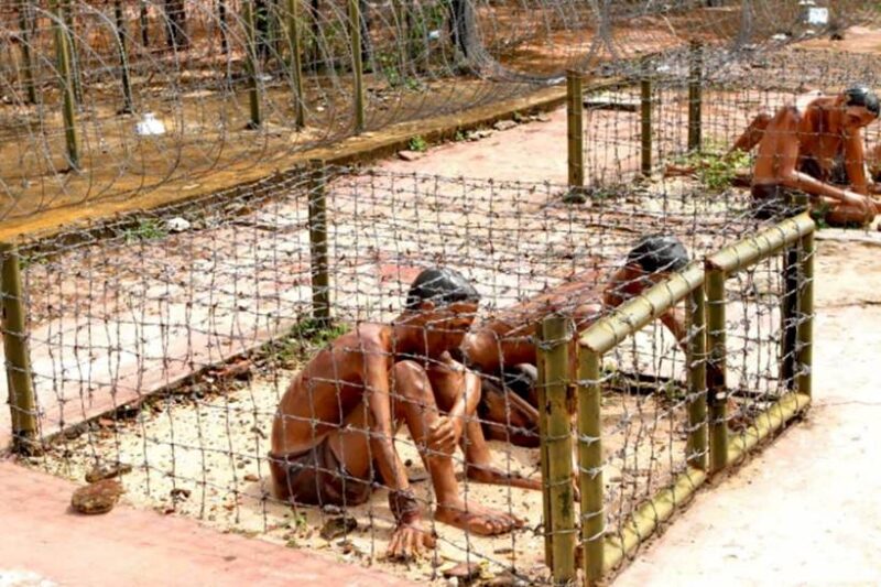 Visiting the “tiger cage” area at Phu Quoc Prisoner of War Camp (Credit: Internet)