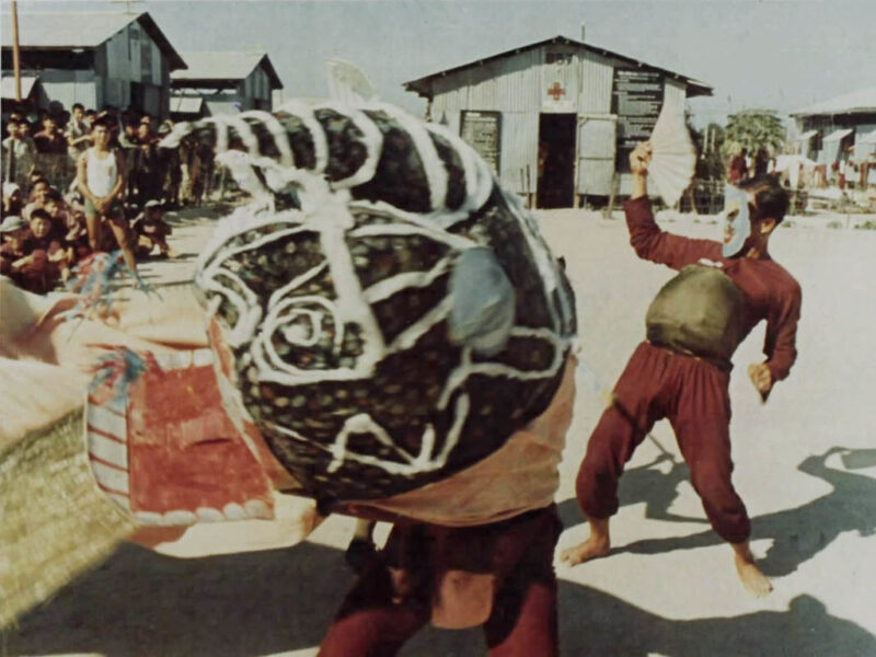Prisoners at Phu Quoc Prison performing a lion dance, preserving solidarity and faith amid harsh captivity.